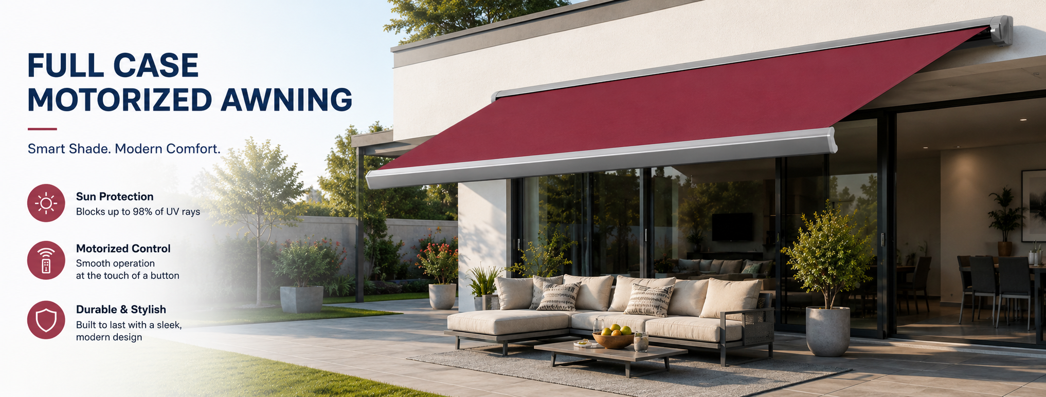 Motorized awning on a building with outdoor furniture and landscaping.